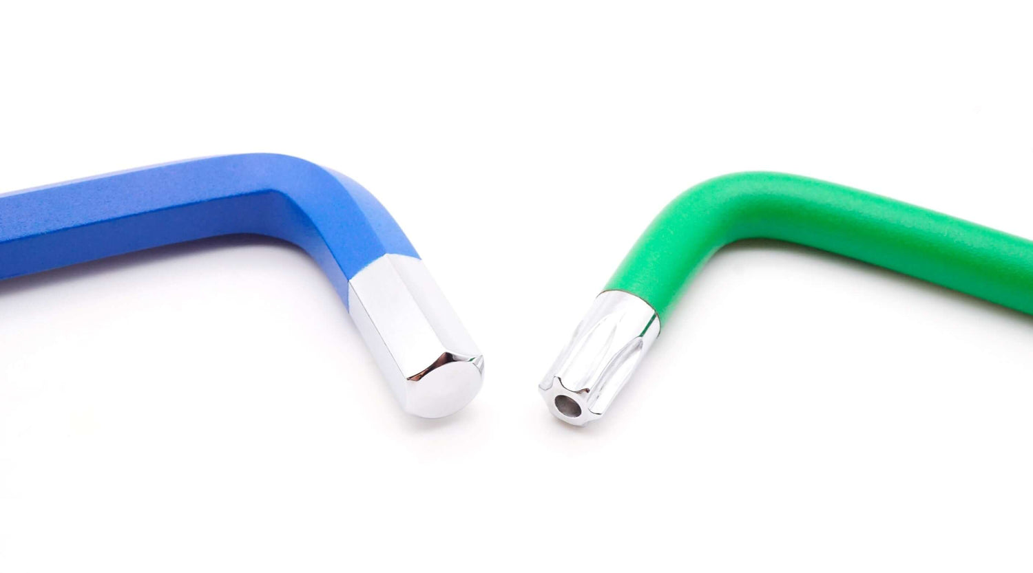 Close-up of a blue Allen key and a green Torx key, highlighting their distinct shapes and designs for tool comparison.