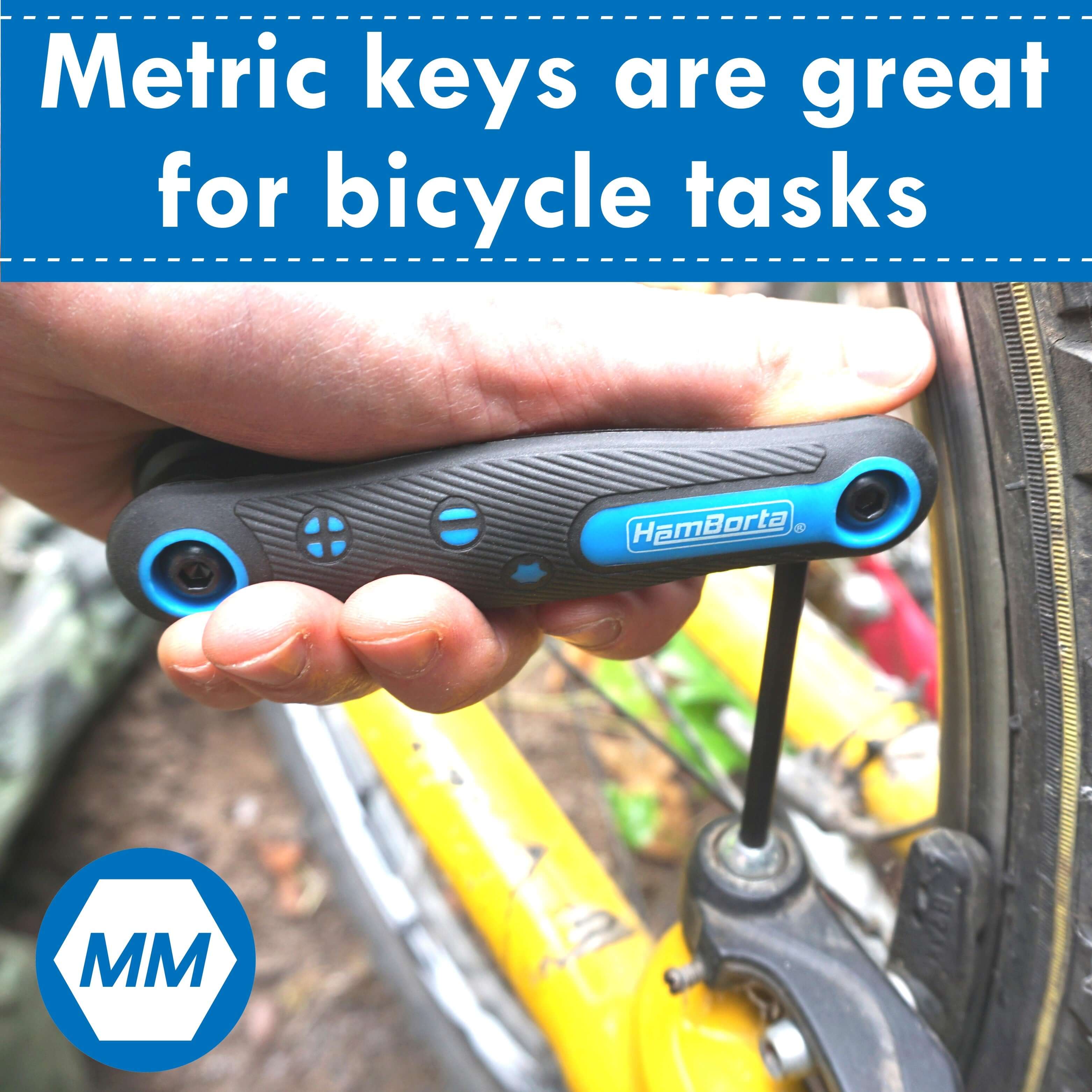 Person using HemBorta metric Allen key for bicycle repairs, showcasing durability and convenience in tool design.