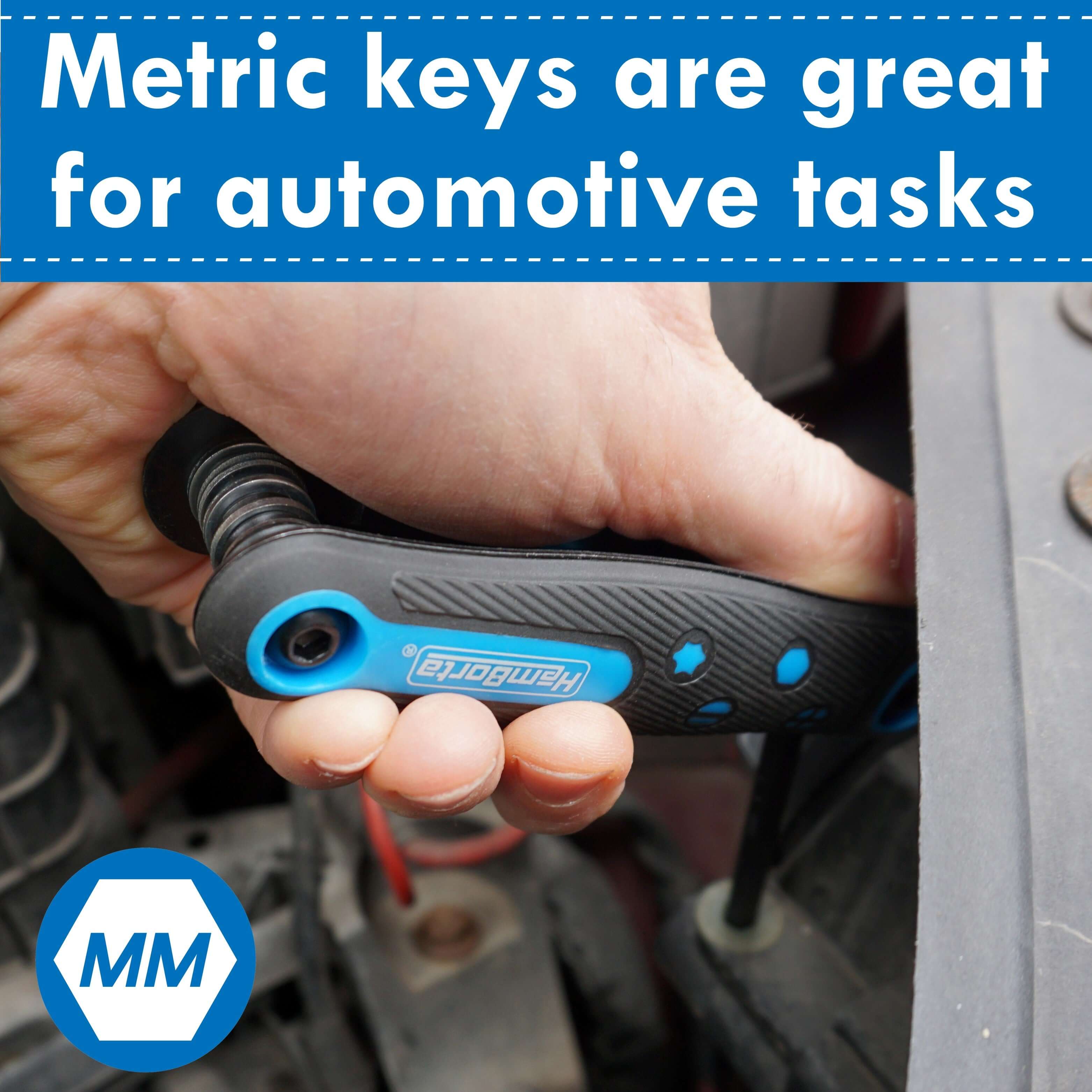 Man using HemBorta metric Allen key for automotive tasks with a gray background.