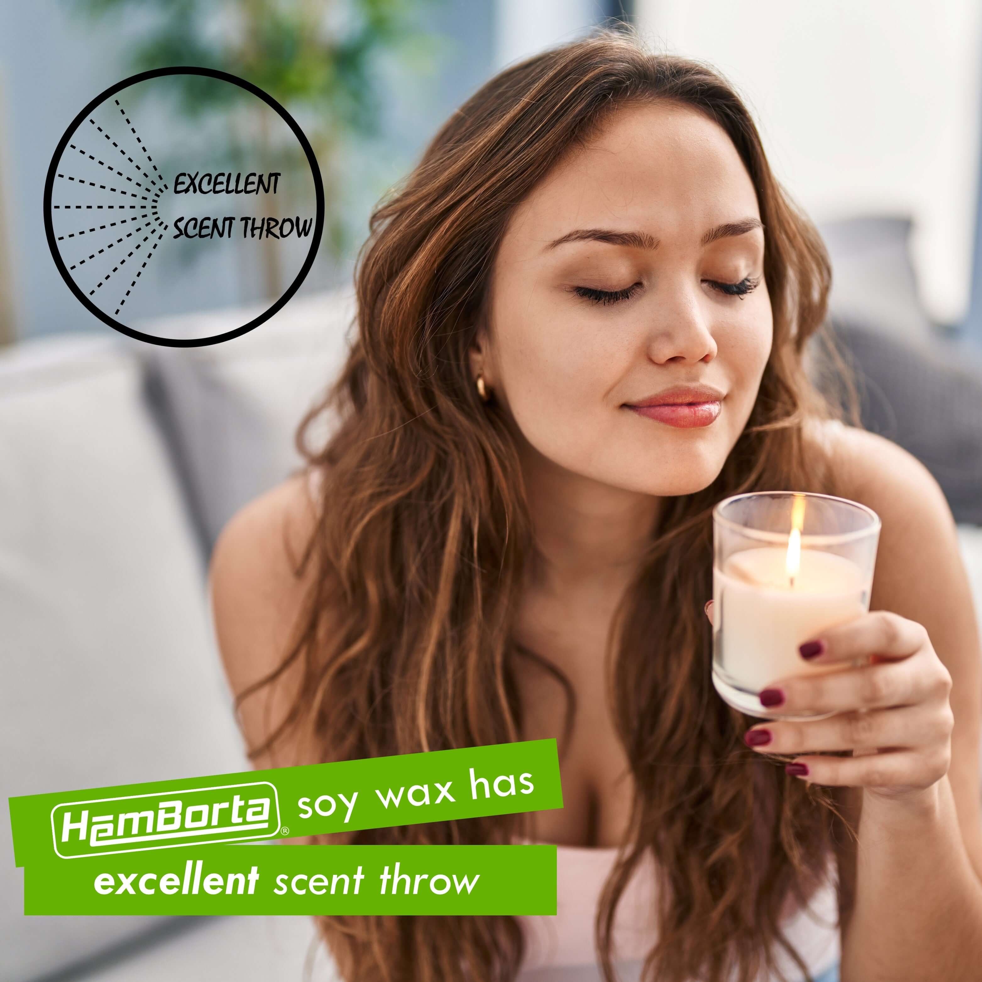 Woman enjoying scented soy candle, showcasing HemBorta soy wax's excellent scent throw for candle making.